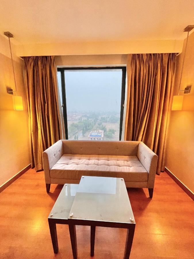 Отель Ramada By Wyndham Jaipur North Экстерьер фото
